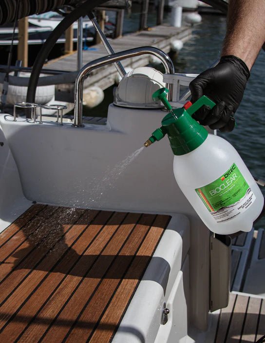 Applying DiTEC BioClear protectant to a boat's surface for enhanced protection.