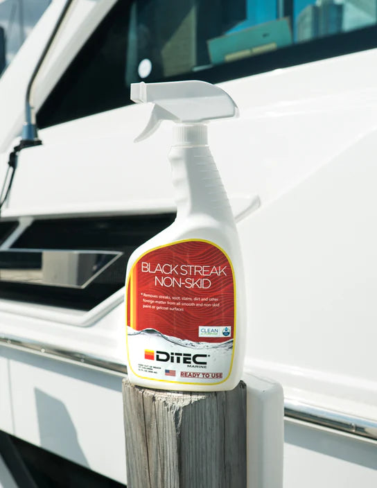 DiTEC Black Streak and Non-Skid Cleaner in use aboard a boat—safe for painted and non-skid surfaces.