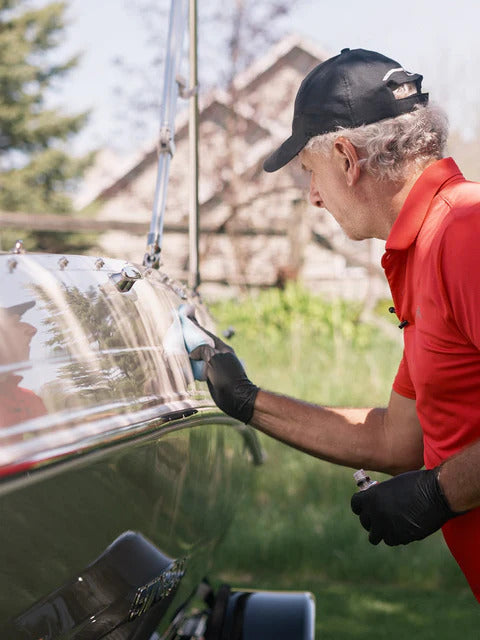 
                  
                    Buffing a boat surface with a microfiber towel to complete the paint and gelcoat protection process.
                  
                